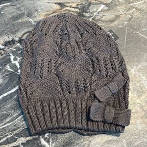 Gray Chuns Knit Beanie with Bow Detailing